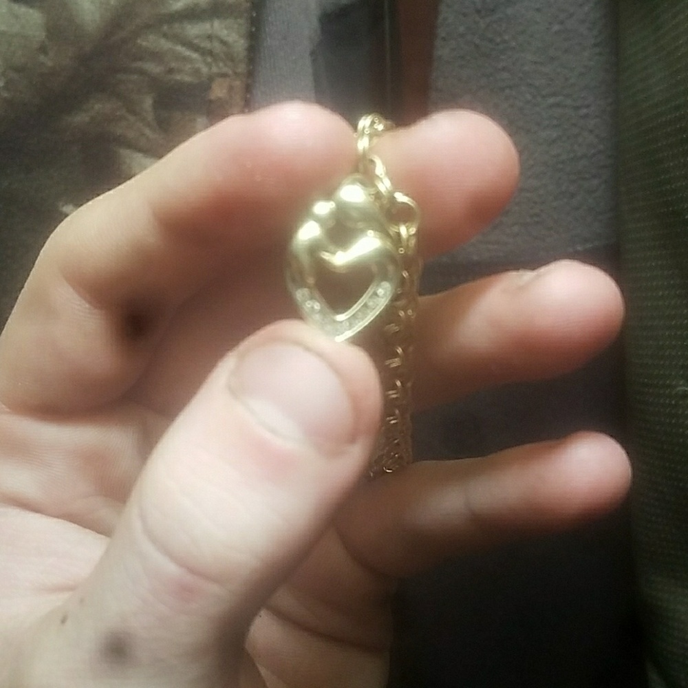 gold bracelet with charms
